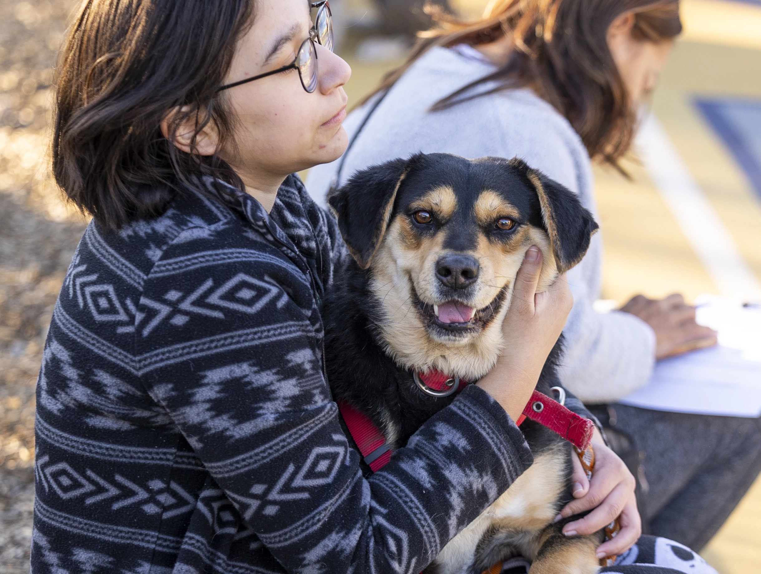 Woman holding dog